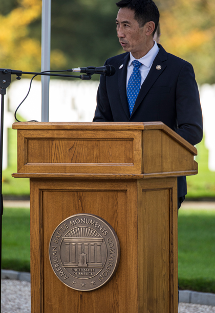 Picture of ABMC Secretary Charles K. Djou delivering remarks at Epinal American Cemetery on Oct. 19, 2024. Credits: American Battle Monuments Commission. 