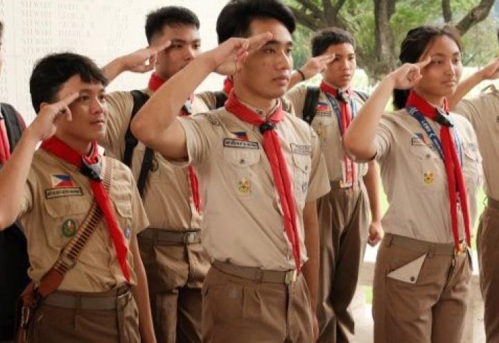 Boy Scouts salute the Wall of the Missing at Manila American Cemetery