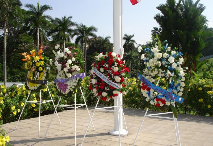 Floral wreaths laid during the ceremony. 