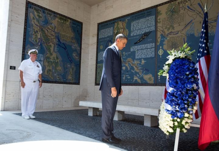 President Obama lays a wreath at Manila American Cemetery during his visit. 