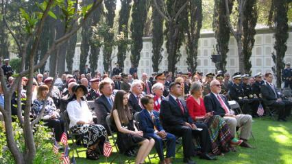 Attendees sit during the ceremony. 