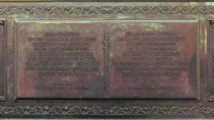 A bronze tablet with inscribed text serves as the Souilly Marker.