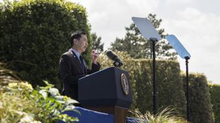 ABMC Secretary Charles K. Djou delivered opening remarks for the 80th anniversary of D-Day at Normandy American Cemetery.